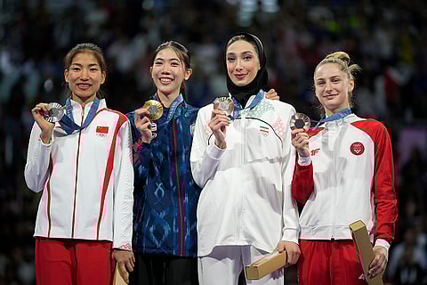 Women's 49kg Taekwondo: China's Guo Qing (Silver), Thailand's Panipak Wongpattankit (Gold), Iran's Mobina Nematzadeh (Bronze), and Croatia's Lena Stojkovic (Bronze)